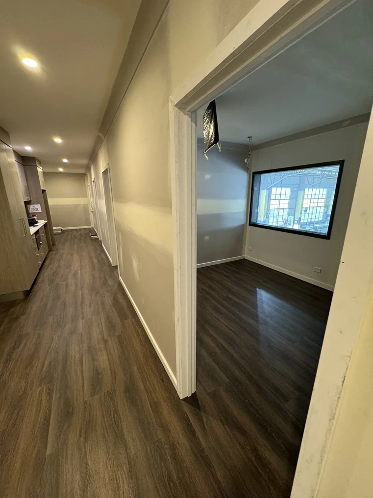 Hybrid flooring installed in a modern hallway