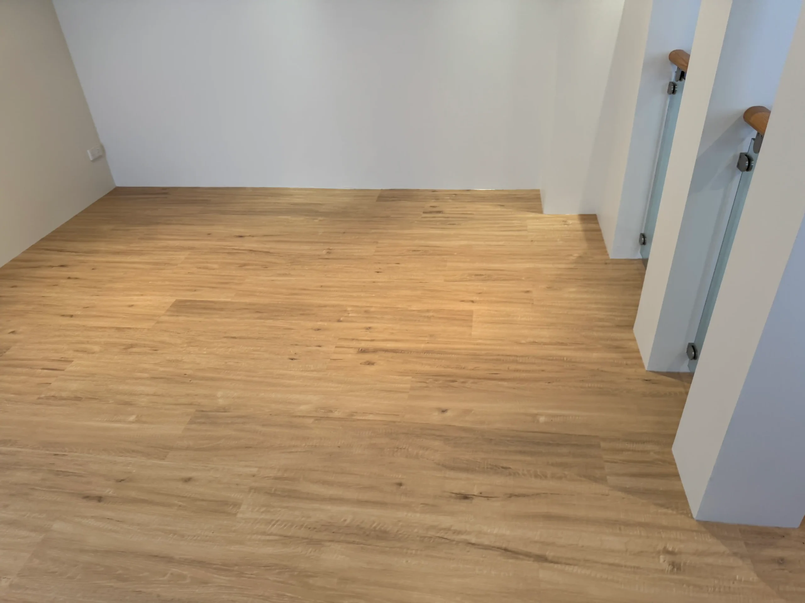 Hybrid timber-look flooring installed in hallway