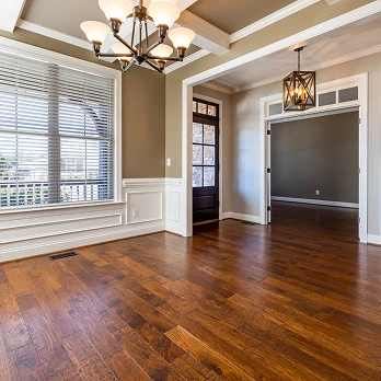 Timber flooring installed in a bright open living area