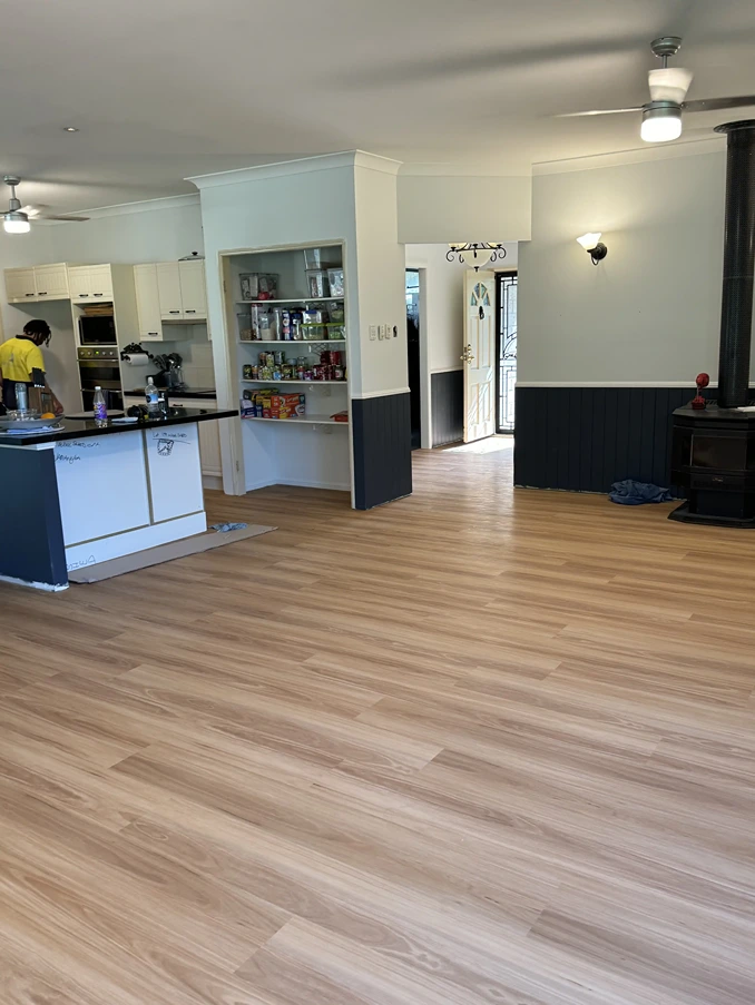 Timber flooring installed in bright open-plan Brisbane living area