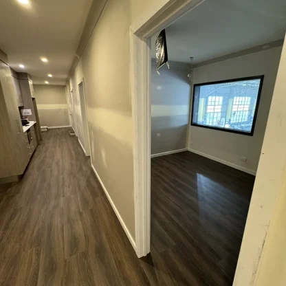 Hybrid flooring installed in a modern hallway